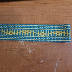 Inkle woven band with pickup design